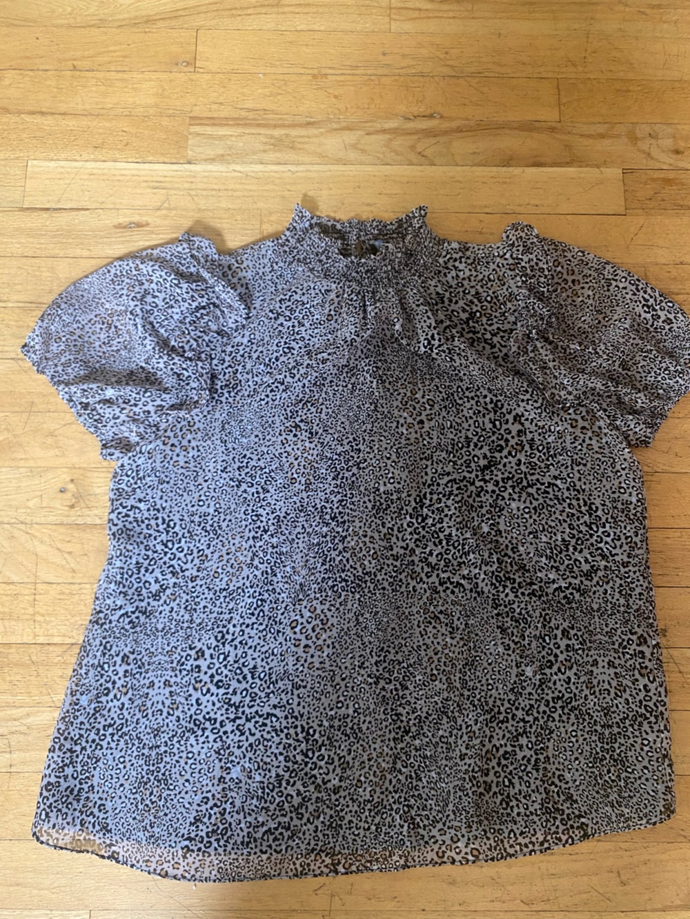 1 state great animal print top. High neck. Elastic on sleeve. Lined. Size large